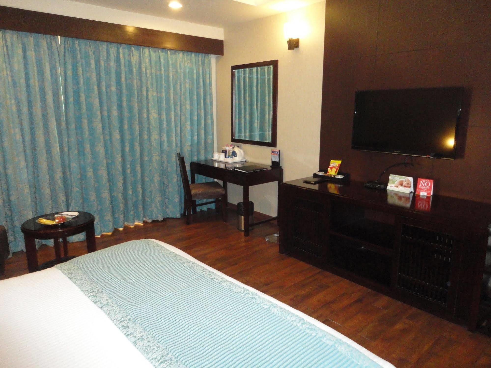 فندق فورتشن سيليكت جراند ريدج تيروباتي المظهر الخارجي الصورة A room at the hotel